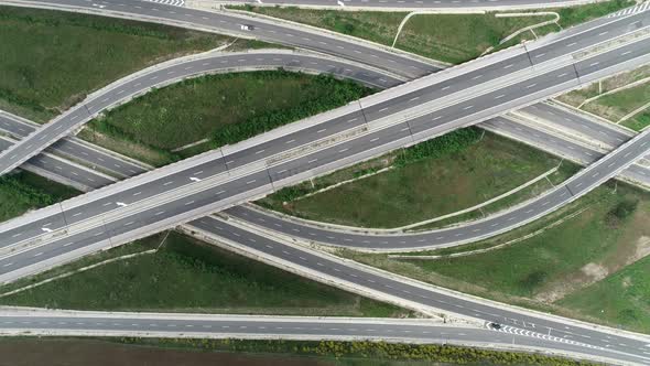 Aerial view of highway and overpass. Road junction, highway intersection top view.