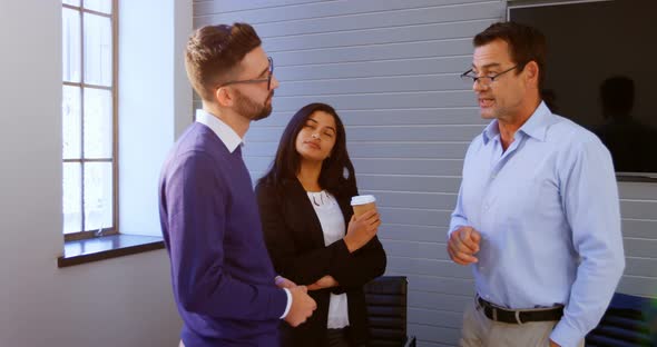 Executives talking in conference room 