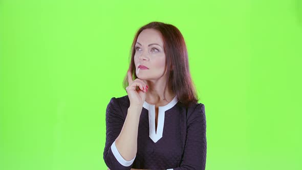 Learned Woman Thinks of Different Theories. Green Screen