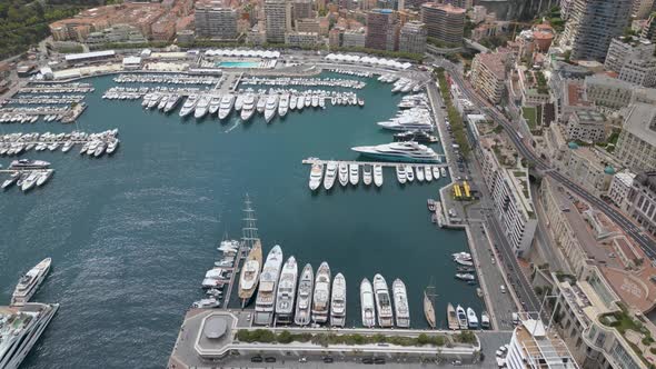 Aerial shot of Hercules port and "Tete de Chien" (Dog's head) mountain in Monaco