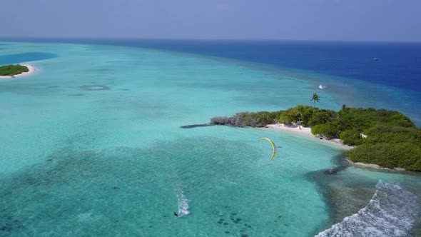 Aerial drone panorama of exotic bay beach by blue water and sand background