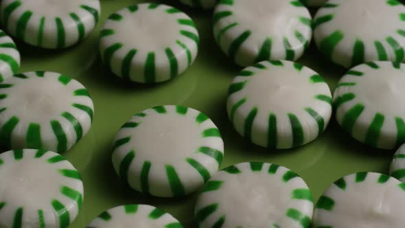 Rotating shot of spearmint hard candies - CANDY SPEARMINT 029