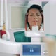 A Woman is Having Her Teeth Scanned with an Xray Machine - VideoHive Item for Sale