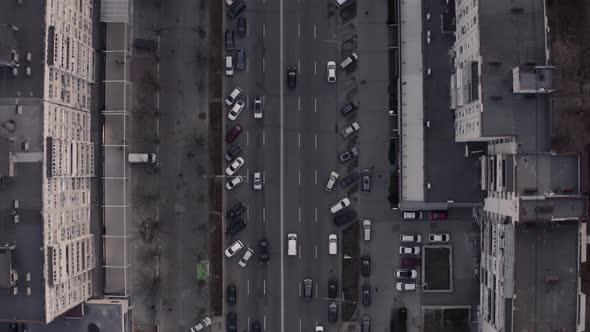 Late Evening Overhead Aerial Drone Flight Top Down View of Busy City Rush Hour Heavy Traffic