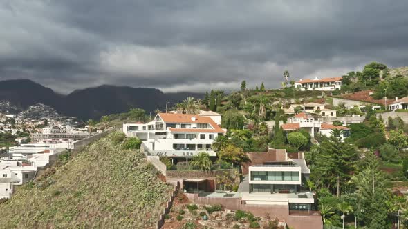 Aerial Footage of Coastal Architecture Within a Magnificent Landscape