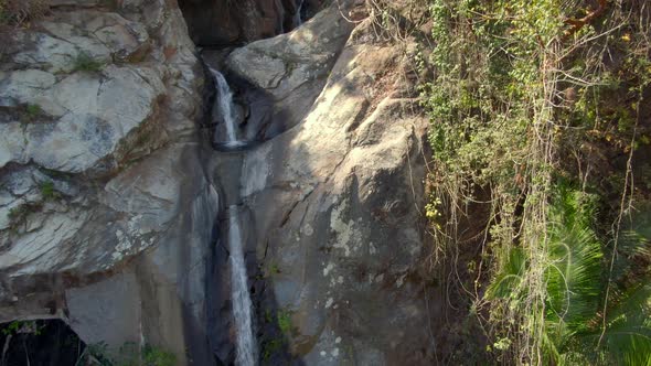 Steep Rocky Mountain In Tropical Forest With Cascade - Cascada de Yelapa In Jalisco, Mexico. Aerial