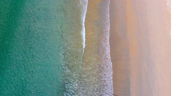 Aerial view beach sand and sew water wave clear, beautiful tropical beach and sea Phuket Thailand