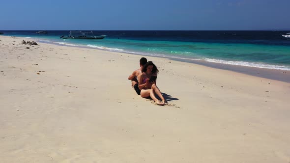 Beautiful Couple on Romantic Honeymoon Enjoy Life on Beach on Sunny White Sandy 