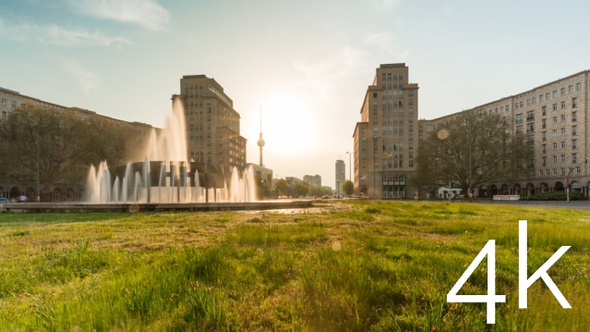 Timelapse of central Berlin place (Straussberger Platz) during golden hour