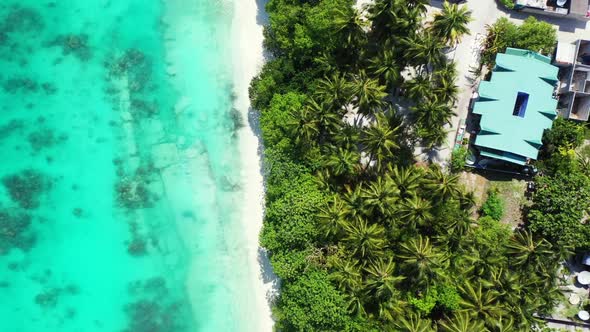 Aerial top view texture of exotic resort beach adventure by blue green lagoon with white sandy backg