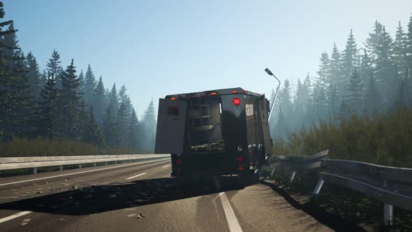 Demolished armored truck on the roadside. Money on the road. Crime scene 4K