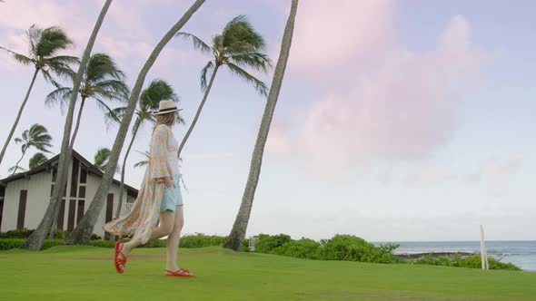 Female Tourist on Summer Vacation on Hawaii Island Kauai Pacific Ocean Coast