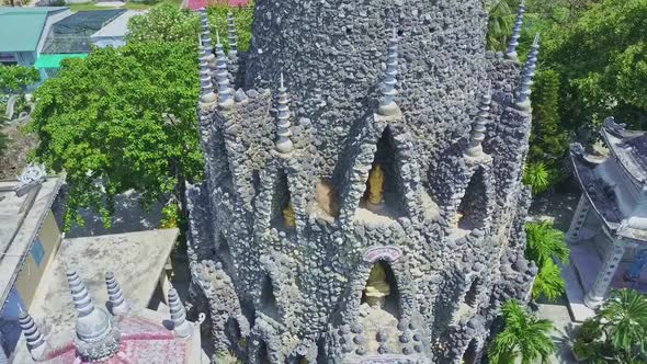 Drone Moves Closely Around Buddhist Temple Coral Tower