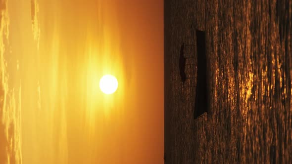 Silhouette of Fishing Boats Anchored at Sunset in the Indian Ocean Zanzibar