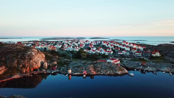 Drone flying over houses next to the sea on the Swedish west coast.