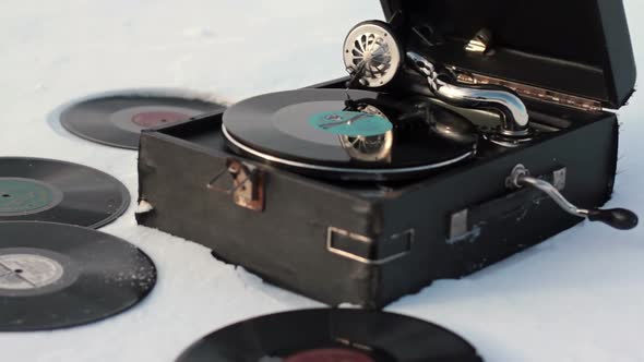 Old Gramophone Record Playing In The Snow 7