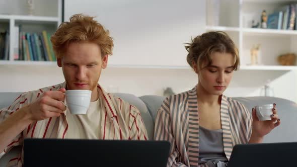 Family Couple Surfing Web on Weekend Morning Closeup