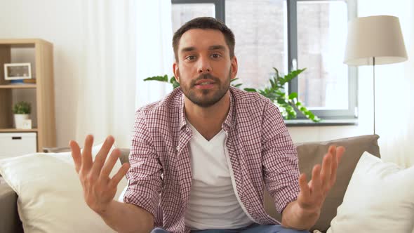 Male Blogger Videoblogging at Home 