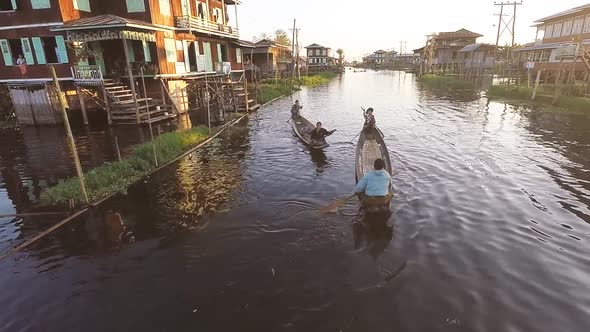 Floating Village Within Picturesque Waterscape During Stunning Sunrise.