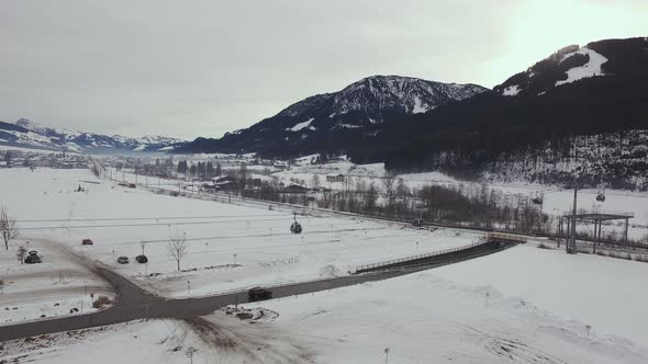 Aerial view of gondola lifts riding