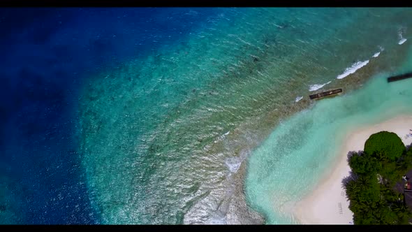 Aerial top down landscape of perfect bay beach journey by shallow ocean with white sand background o