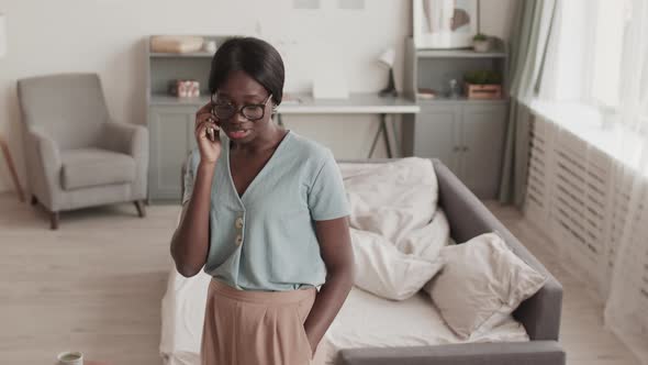 African-American Woman Talking in Telephone