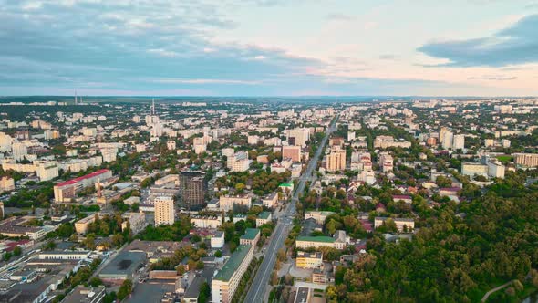 Aerial drone view of Chisinau, Moldova. Buildings, roads, greenery, cloudy sky