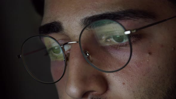 Young Brunette Man Eyes Closeup Computer Screen Reflection in Circle Glasses