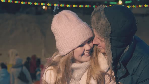 Cute Young Couple Has Fun at Christmas Fair Slow Motion