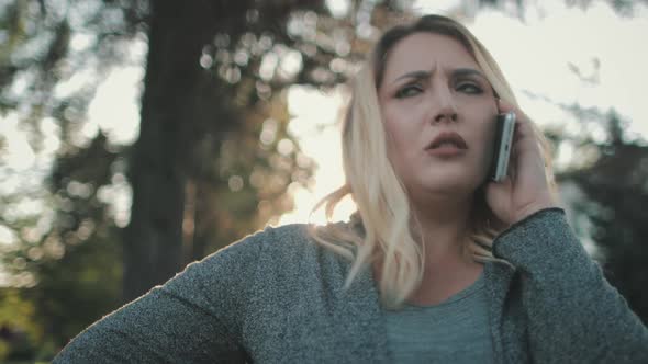 Unhappy Blonde Woman Plus Size Talk Smartphone