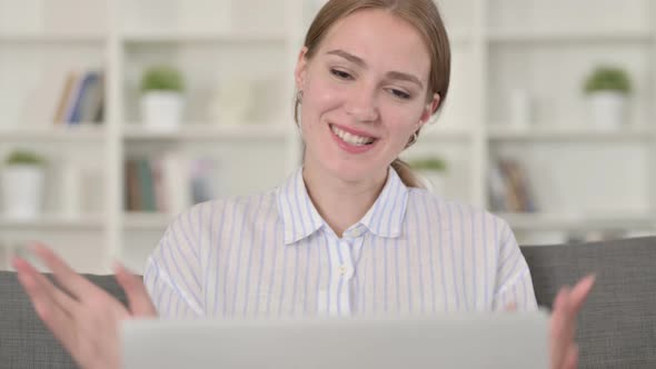 Portrait of Young Woman Doing Video Call on Laptop 