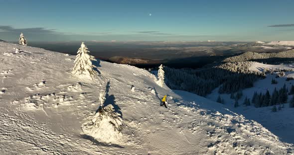 Fly Over and Around the Mountains of Ciucas Romania in January 2022 Sunny Day