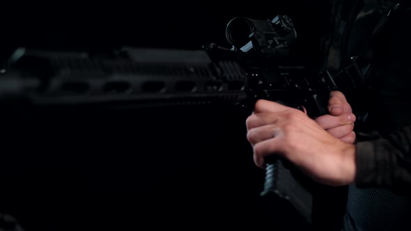Modern Kalashnikov assault rifle is loaded with ammunition