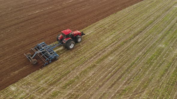 Tractor Performing Tillage Disc Cultivator