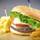 Delicious grilled hamburger with potato chips on wooden board - VideoHive Item for Sale