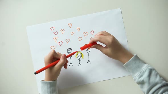 Child Painting Family and Putting Heart Sign Dreaming About Love and Care