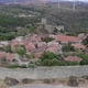 Ancient medieval walls of Sortelha village with granite rural houses, Portugal. Aerial circling - VideoHive Item for Sale