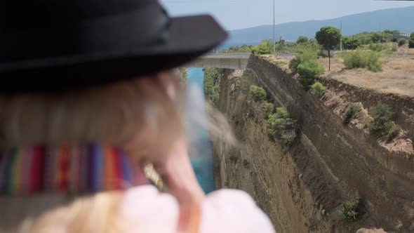 Woman Looking at Corinth Canal