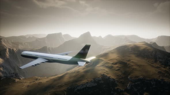 Passenger Aircraft Over Mountain Landscape alt