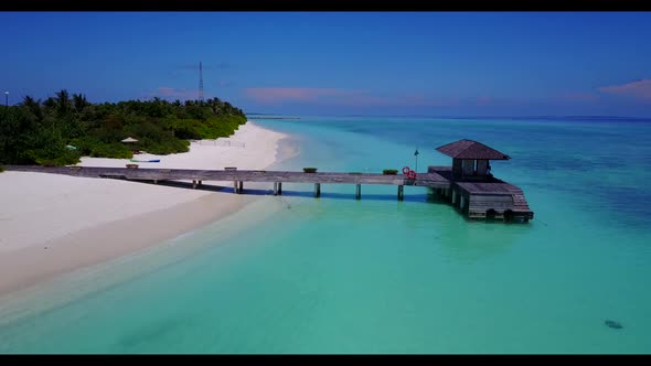 Aerial texture of beautiful bay beach voyage by turquoise water with white sand background of advent