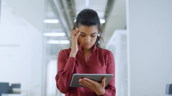 African Girl Looking Tablet Screen Office