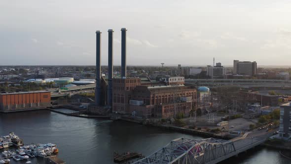 Aerial view of a power station, city and highway traffic in Providence, Rhode Island - aerial view