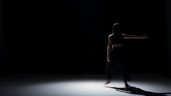 Sensual Contemporary Dance Performance of One Dancers on Black, Shadow