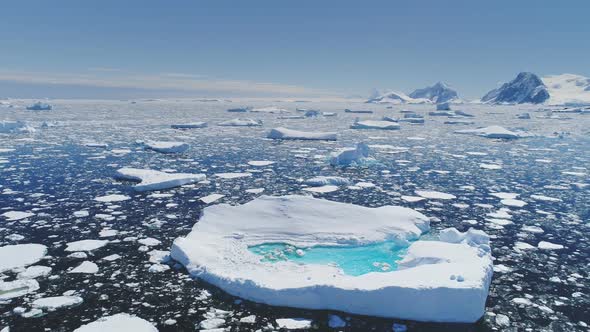 Antarctica Melting Blue Water Iceberg Aerial View