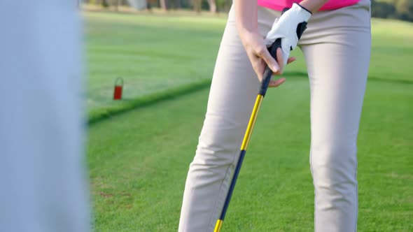 Two golfers playing golf together