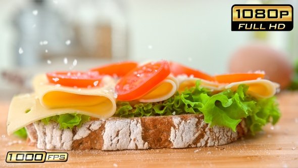 Salting Sandwich with Cheese and Tomato