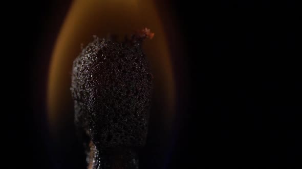 Match Instantly Lights Up and Goes Out. Slow Motion. Black Background. Close Up