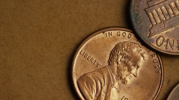 Rotating stock footage shot of American pennies (coin - $0.01) - MONEY 0164