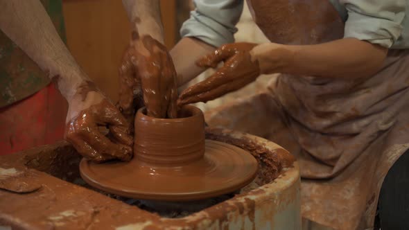 Pottery Classes Woman Making Clay Pot on Wheel