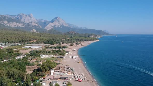 Aerial drone shot of the ocean, beach and mountain coast in Antalya, Kemer, Turkey